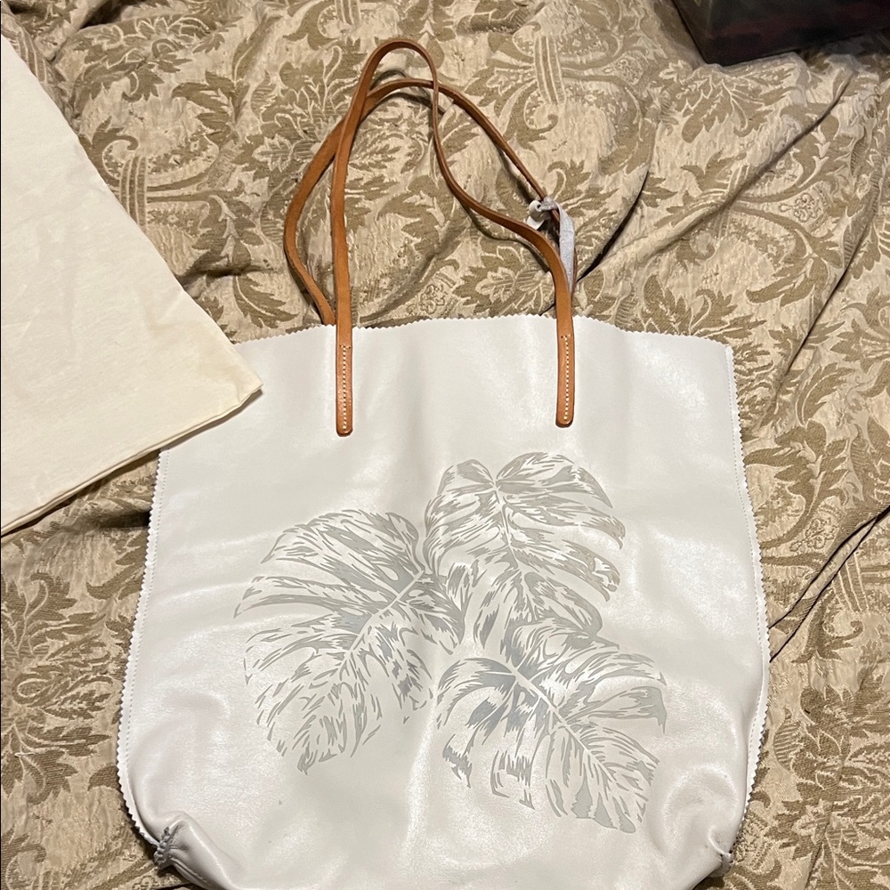 Elegant White Tote Bag with Tan Straps